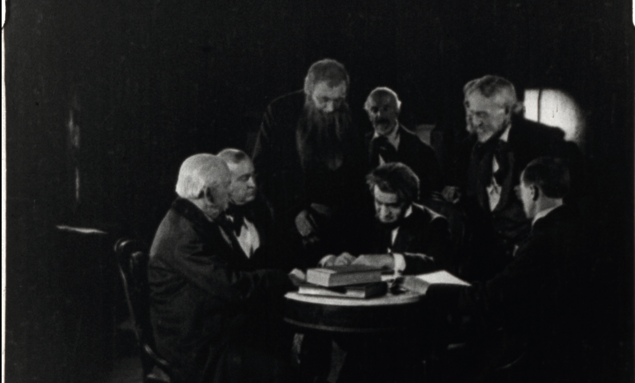 Abraham Lincoln, played by Francis Ford, signs the proclamation calling for volunteers for the Civil War in 1861 in the film.